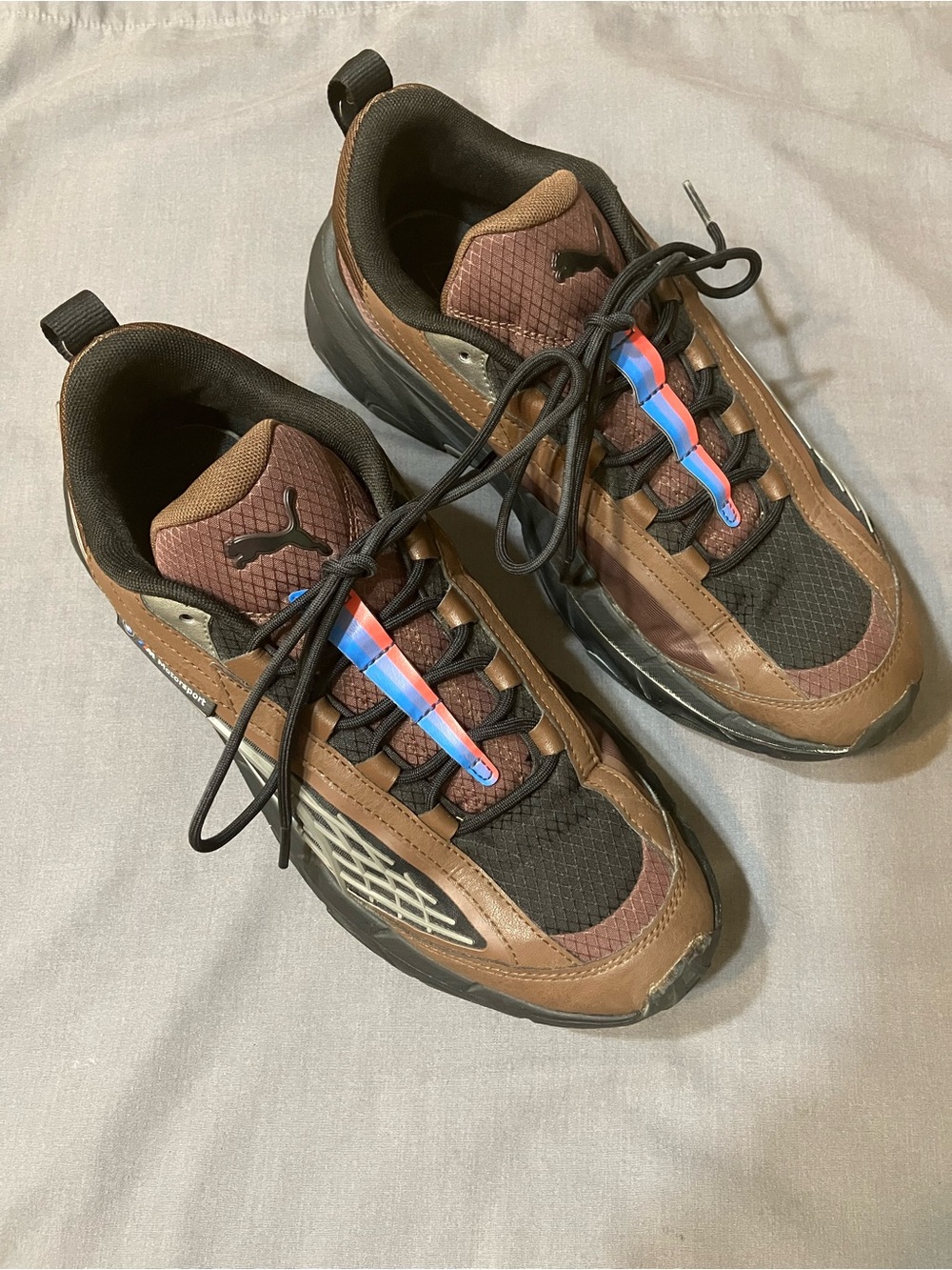 Puma Men’s Brown and Black Sneakers with Blue Accent